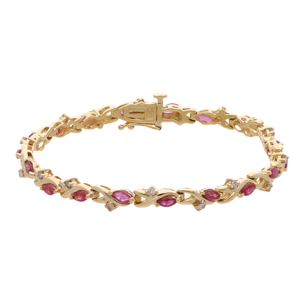 Pulsera eslabón articulado con Rubies y diamantes en oro amarillo 14 kilates.