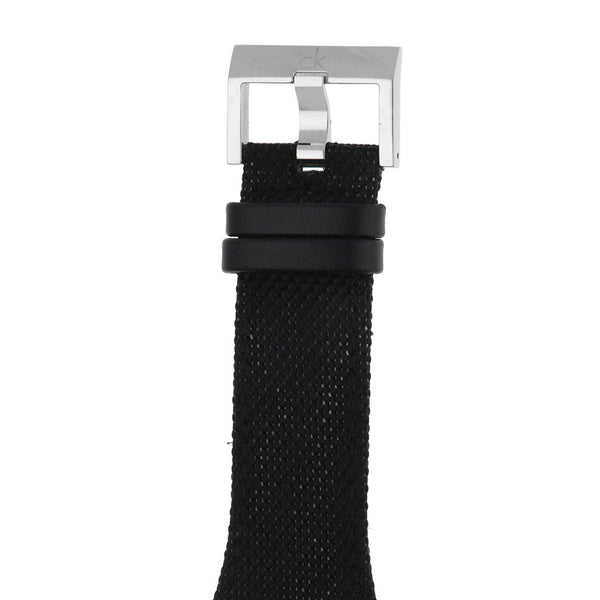 Reloj Calvin Klein para caballero en acero inoxidable correa textil/cuero.