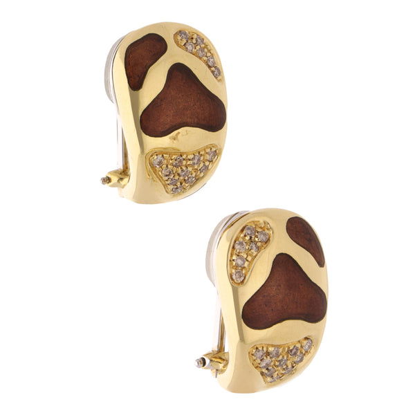 Aretes estilizados con diamantes y esmalte en oro amarillo18 kilates.