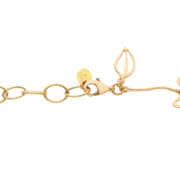 Pulsera eslabón combinado motivo floral firma Tous en oro amarillo 18 kilates.