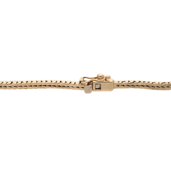 Pulsera hechura italiana en oro tres tonos 14 kilates.