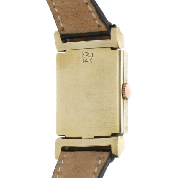 Reloj Lord Elgin para dama en oro amarillo 14 kilates correa piel.