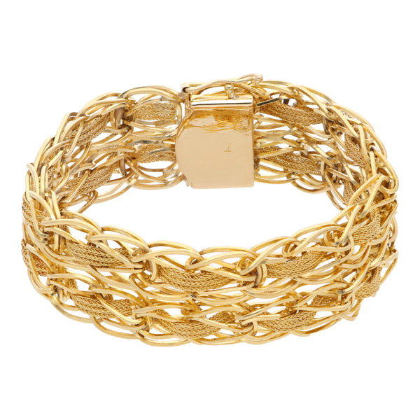 Pulsera eslabón combinado en oro amarillo 14 kilates.