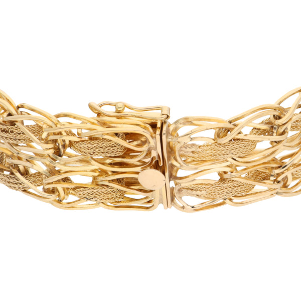 Pulsera eslabón combinado en oro amarillo 14 kilates.