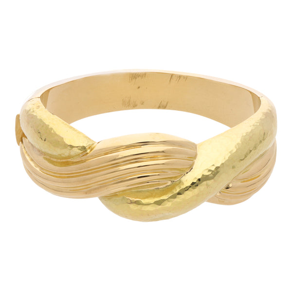 Brazalete articulado en oro amarillo 18 kilates.