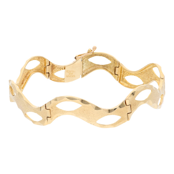 Pulsera eslabón articulado en oro amarillo 14 kilates.