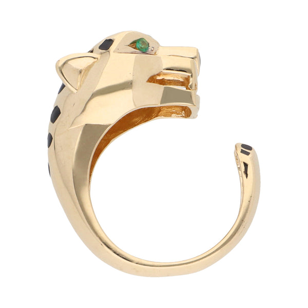 Anillo abierto motivo felino con sintéticos y esmalte en oro amarillo 14 kilates.