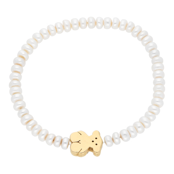 Pulsera hechura especial con perlas y aplicación motivo oso firma Tous en oro amarillo 18 kilates.