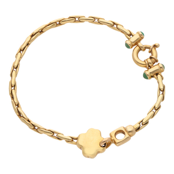 Pulsera eslabón cruzado con sintéticos en oro amarillo 14 kilates.