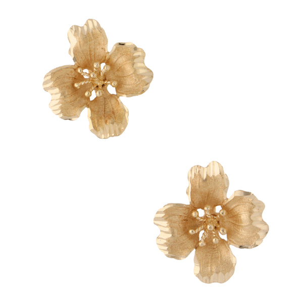 Aretes hechura especial motivo flor en oro amarillo 14 kilates.