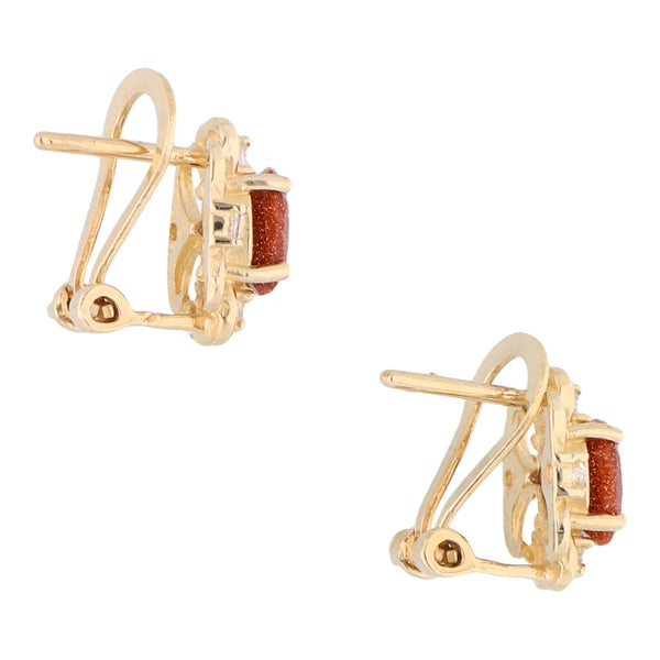 Aretes calados con acerinas y circonias en oro amarillo 14 kilates.