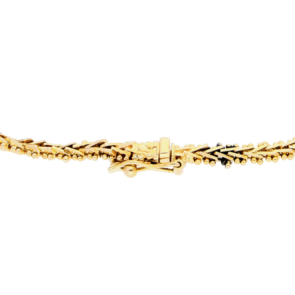 Pulsera eslabón boleado en oro amarillo 18 kilates.