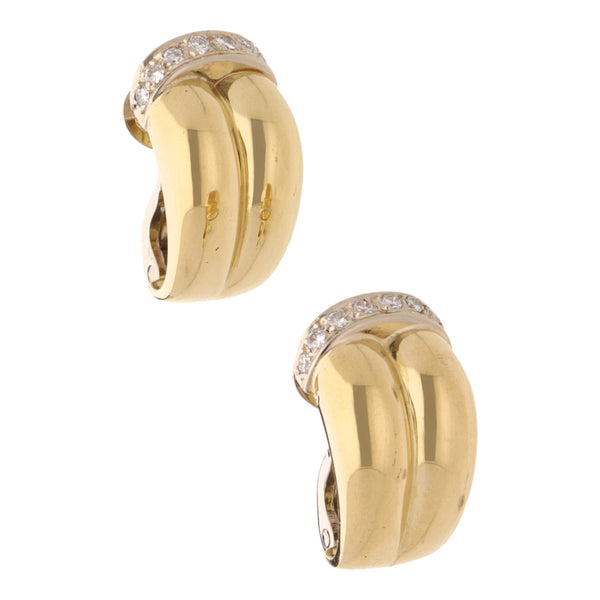 Aretes hechura especial con diamantes en oro dos tonos 18 kilates.