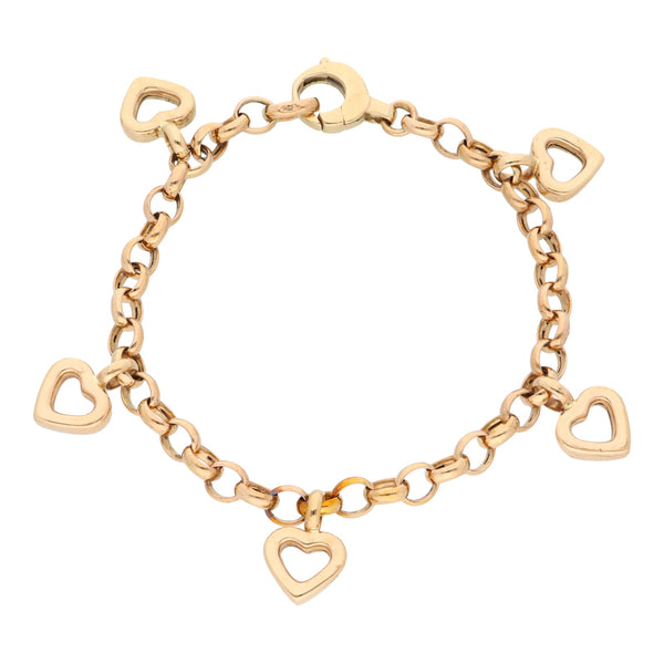 Pulsera eslabón cruzado con cinco dijes motivo corazón en oro amarillo 14 kilates.