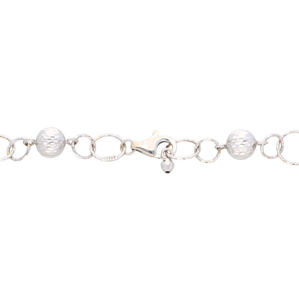 Pulsera eslabón combinado en oro blanco 14 kilates.