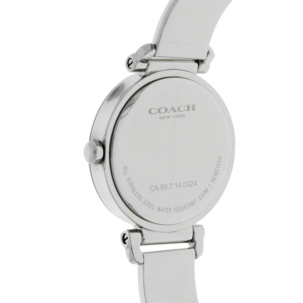 Reloj Coach para dama en acero inoxidable.