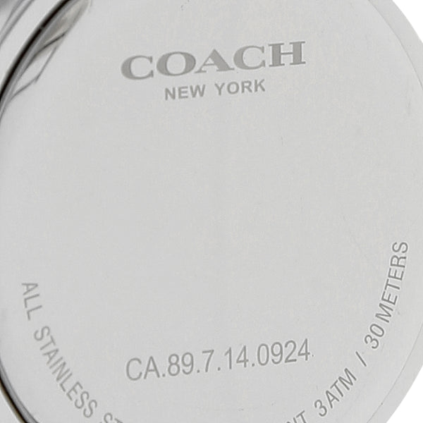 Reloj Coach para dama en acero inoxidable.