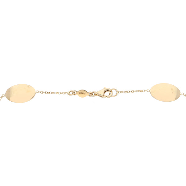 Pulsera eslabón combinado en oro amarillo 14 kilates.