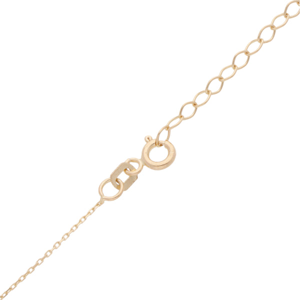 Collar eslabón cruzado y dije motivo toro con sintéticos en oro amarillo 14 kilates.