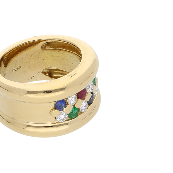 Anillo diseño especial con diamantes, esmeraldas, zafiros y Rubí en oro amarillo 18 kilates.