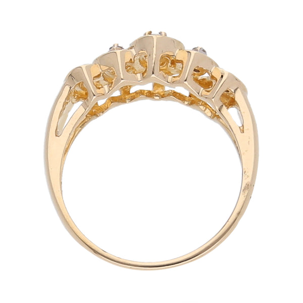 Anillo calado con diamantes en oro amarillo 14 kilates.