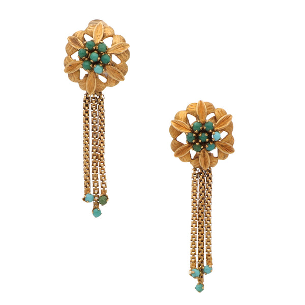 Aretes con colgantes y turquesas motivo floral en oro dos tonos 18 kilates.