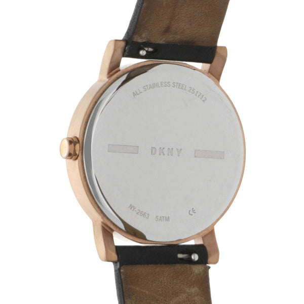 Reloj DKNY para dama en acero chapa correa piel.