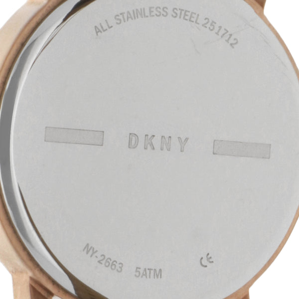 Reloj DKNY para dama en acero chapa correa piel.