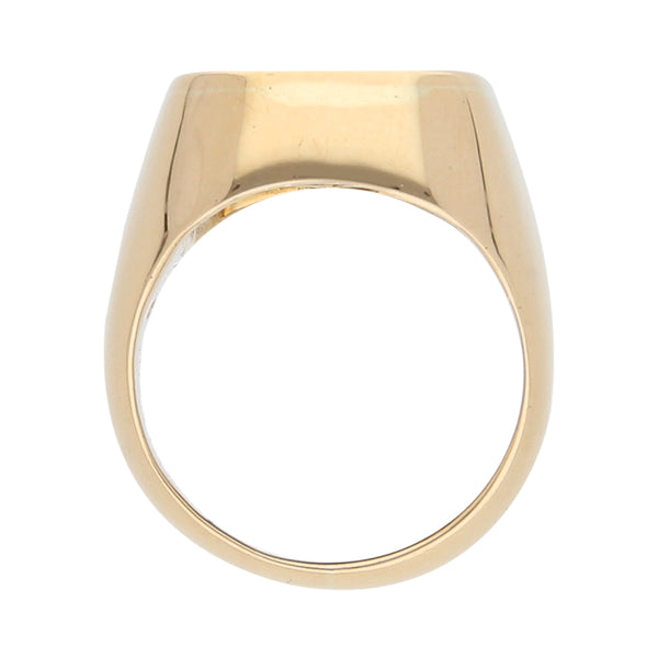 Anillo tipo sello con ónix en oro amarillo 18 kilates.