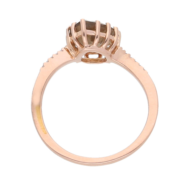 Anillo diseño especial con sintéticos en oro rosa 14 kilates.