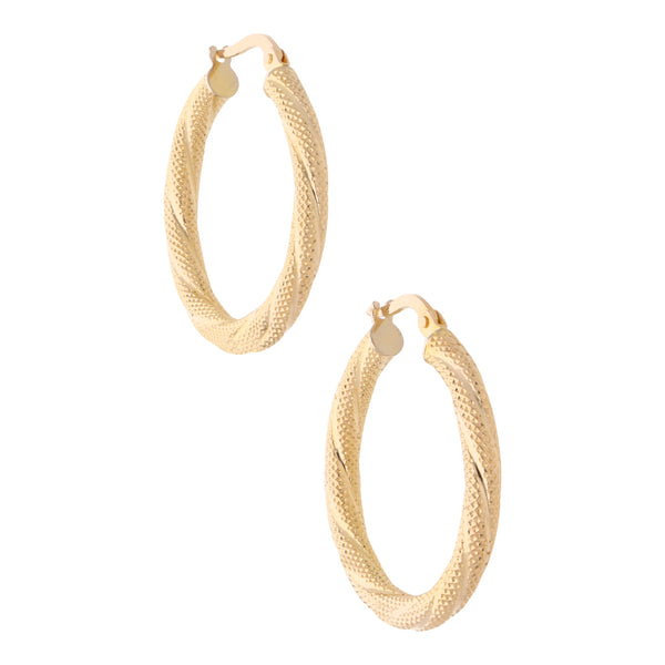 Arracadas martilladas en oro amarillo 14 kilates.