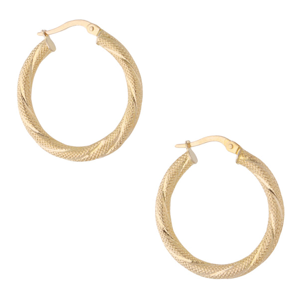 Arracadas martilladas en oro amarillo 14 kilates.