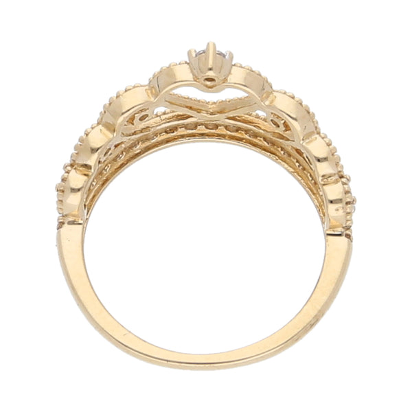 Anillo calado motivo tiara con sintéticos en oro amarillo 14 kilates.