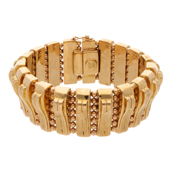 Pulsera eslabón combinado en oro amarillo 18 kilates.