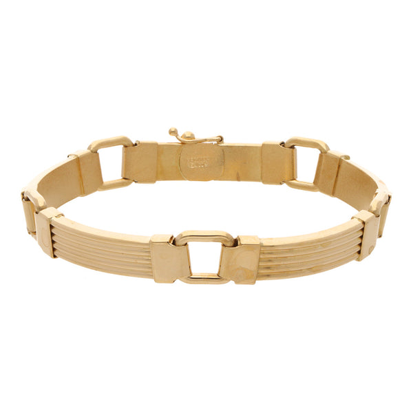 Pulsera eslabón combinado en oro amarillo 18 kilates.