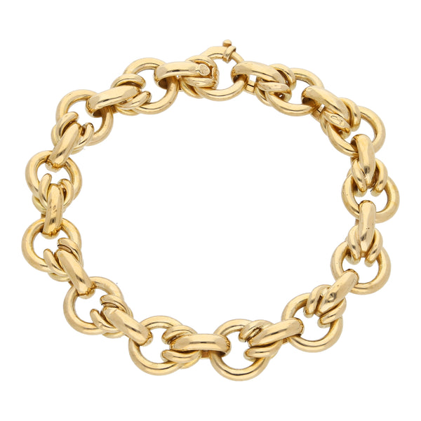 Pulsera eslabón combinado en oro amarillo 18 kilates.