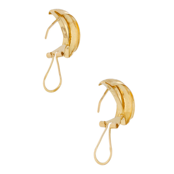 Aretes martillados en oro amarillo 18 kilates.