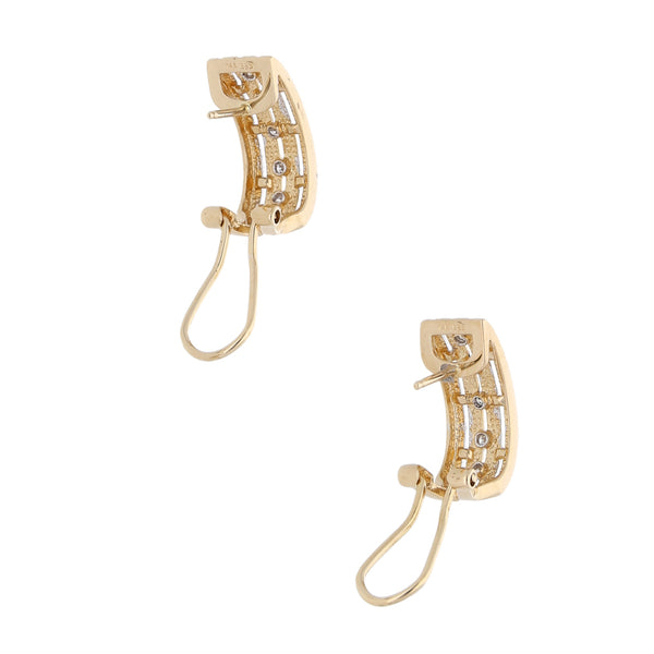 Aretes calados con diamantes en oro dos tonos 14 kilates.