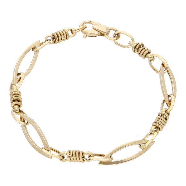 Pulsera eslabón combinado en oro amarillo 14 kilates.