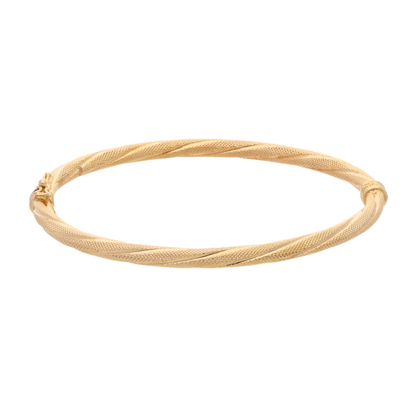 Pulsera de arillo articulada torzal en oro amarillo 14 kilates.