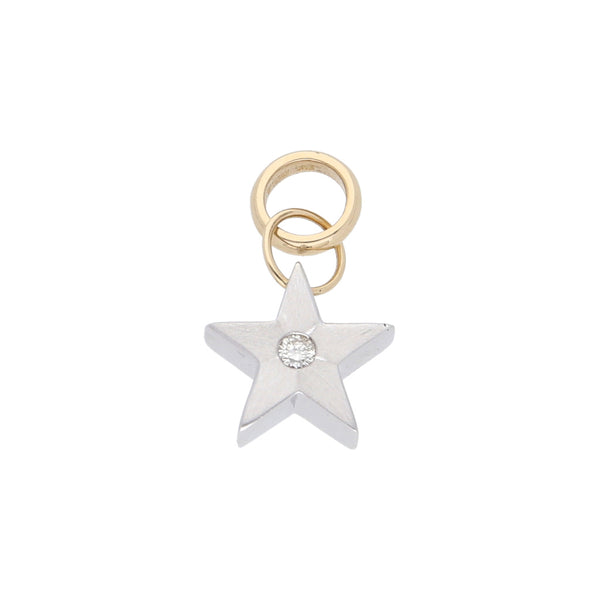 Dije diseño especial motivo estrella con diamante y argolla en oro dos tonos 14 kilates.