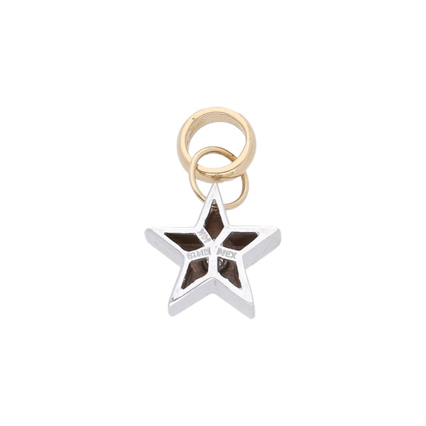 Dije diseño especial motivo estrella con diamante y argolla en oro dos tonos 14 kilates.