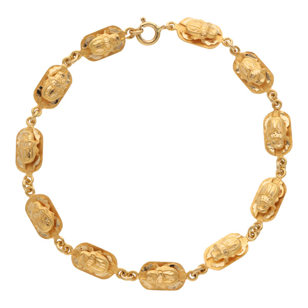 Pulsera eslabón encontrado motivo escarabajos en oro amarillo 18 kilates.