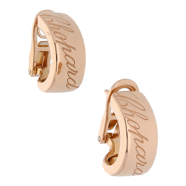 Aretes estilizados firma Chopard en oro rosa 18 kilates.