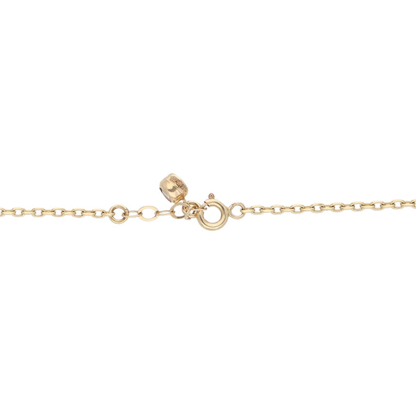 Pulsera eslabón cruzado con dije motivo flor con sintéticos en oro amarillo 14 kilates.