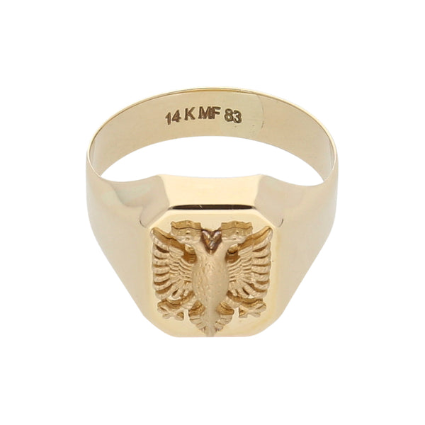 Anillo tipo sello motivo águila de dos cabezas en oro amarillo 14 kilates.