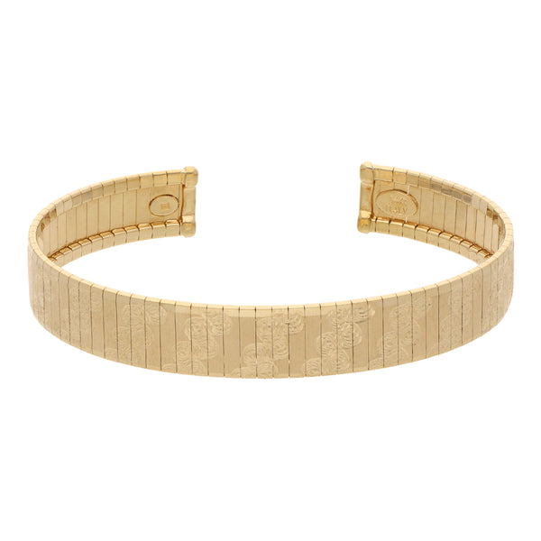 Pulsera abierta labrada en oro amarillo 14 kilates.