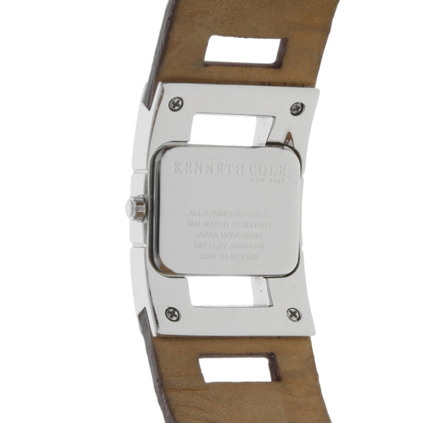 Reloj Kenneth Cole para dama en acero inoxidable correa piel.