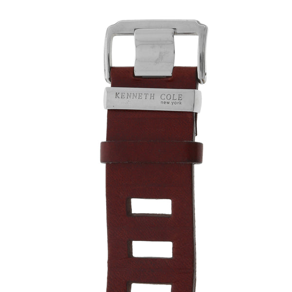 Reloj Kenneth Cole para dama en acero inoxidable correa piel.