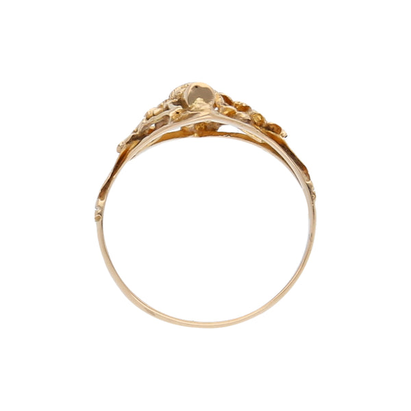 Anillo estilizado motivo floral en oro amarillo 18 kilates.